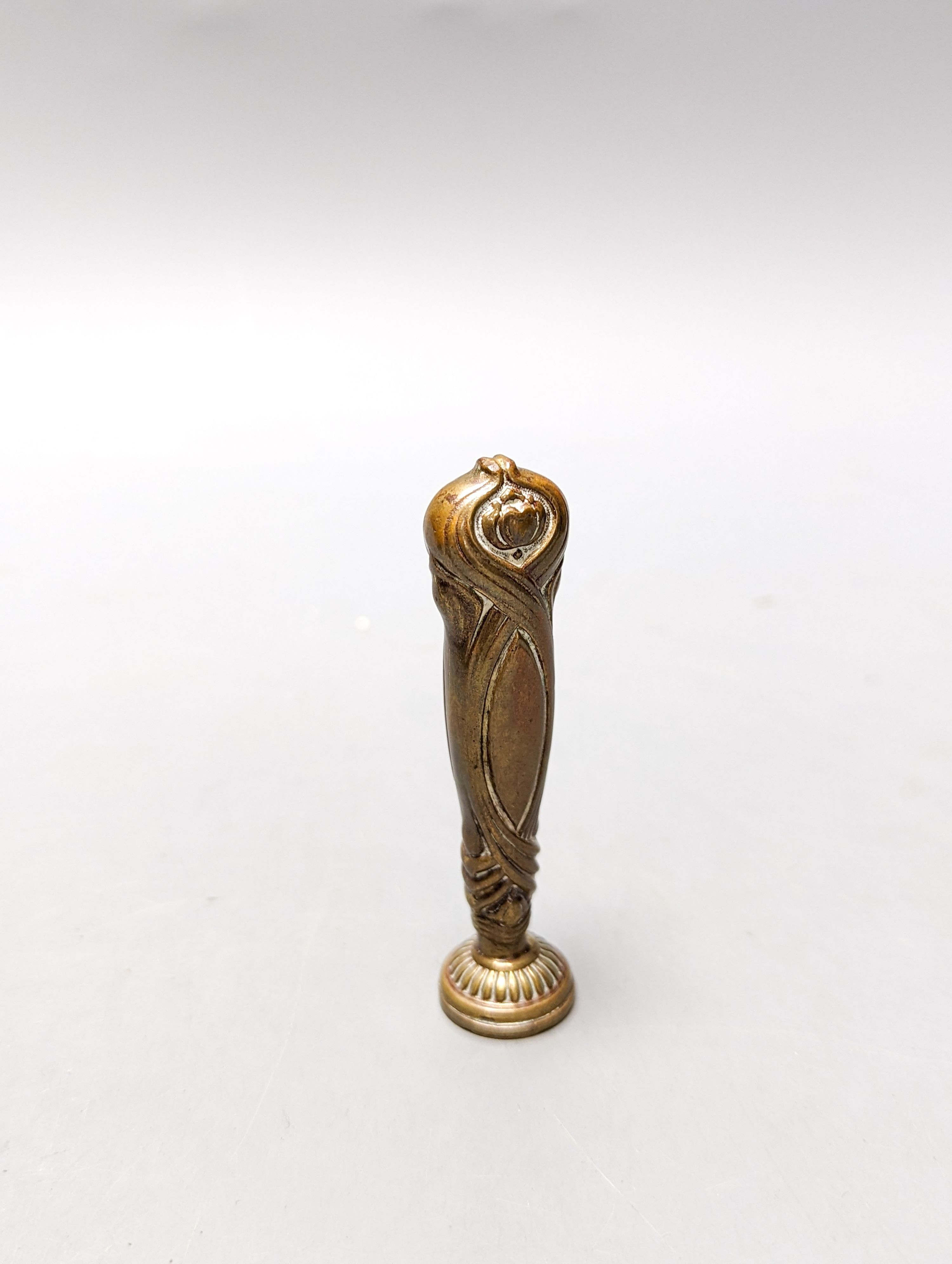 An Arts and Crafts brass/copper group - figural gimbal lamp, mantle timepiece, lidded box etc.